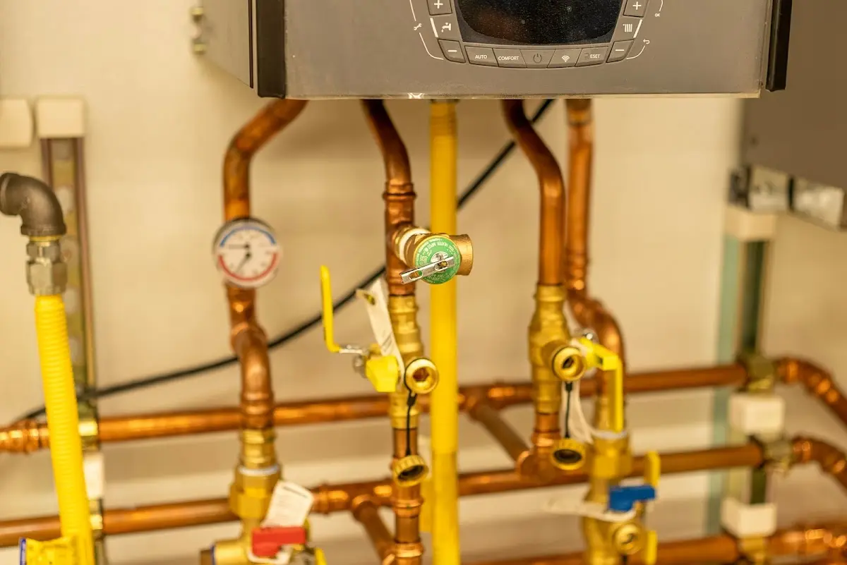 Licensed technician providing Backflow Prevention for a homeowner in Massena